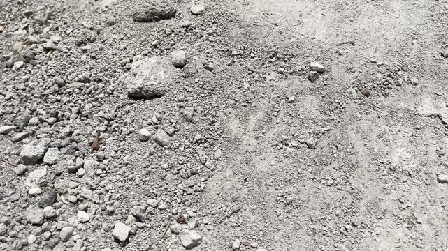 Dry granular sand texture on construction site or desert