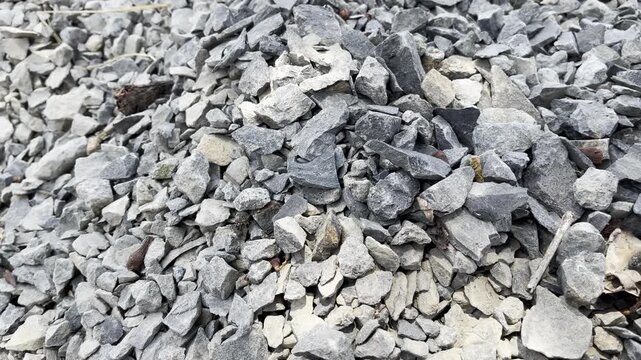 Crushed aggregate stone pile for road infrastructure construction