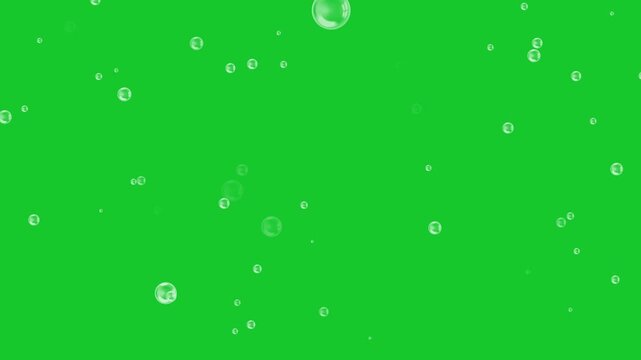 Rising bubbles on green screen background chroma key alpha channel.
 Front View of Bubbles Raising on Black Background in Slow Motion, Blue water bubbles rising on transparent background,