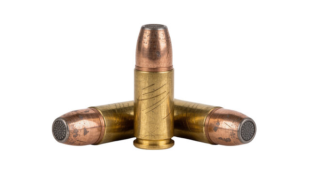 Three brass and copper bullets arranged in a triangular formation, isolated on transparent background