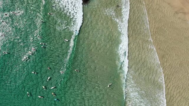 Overhead aerial footage of the surf lineup at Snapper Rocks, Coolangatta, Queensland Australia