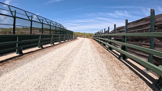 Via de la Plata, wooden and metal bridge over the railway near Embalse de Alcantara, province of Caceres, Extremadura, Spain