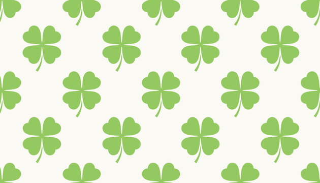 A seamless repeating pattern of vibrant green four-leaf clovers scattered evenly across a soft neutral background.