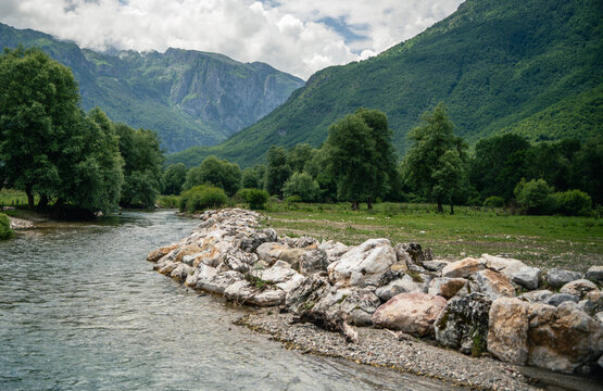Beautiful mountain landscape in Prokletije National Park, Montenegro. Fast river flowing through scenic valley.