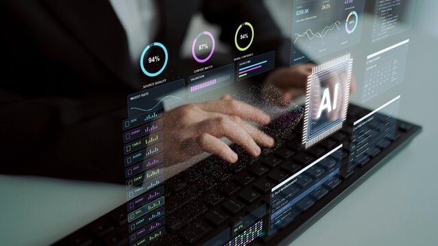 A person types on a keyboard. An AI operations hub combines data interpretation with financial work, bringing transaction processing, reporting and team activity into a connected workflow.