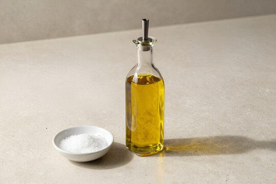 Glass oil cruet on a stone counter