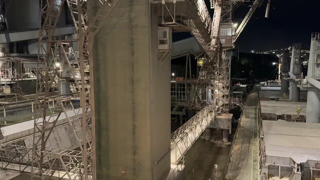 night view of ship moored to silo terminal berth