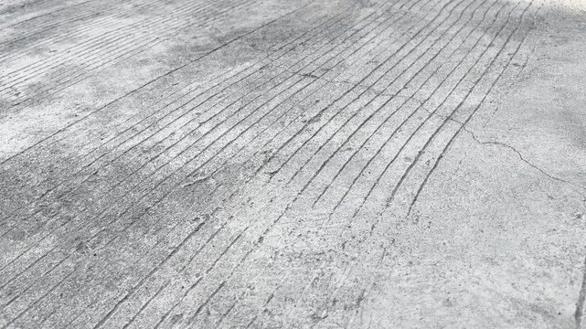 Grooved concrete pavement surface texture with linear lines