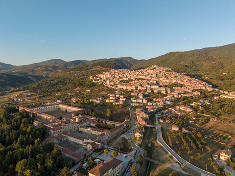 Aerial view of the Carthusian Monastery of Padula (Certosa di San Lorenzo) and the historic village in Campania, Italy, a UNESCO World Heritage Site.
