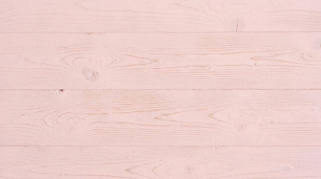 Pale pink wood texture background, subtle grain, horizontal planks, natural surface for design backdrop