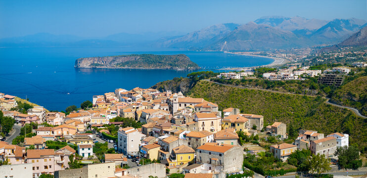San Nicola Arcella one of the most beautiful villages of Italy, high resolution panorama pink rooftops to cliffside town and Dino island Calabria Italy. summer destination travel