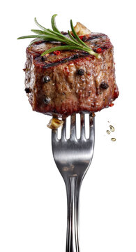PNG Grilled steak cube on fork with rosemary and pepper