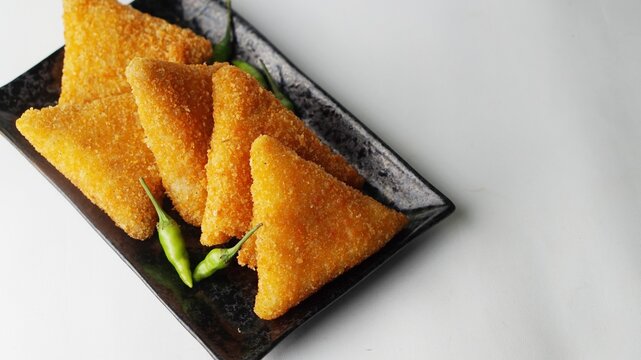 risol mayo (risoles mayo snack) isolated white background. Risoles mayo is one of popular food in Indonesia