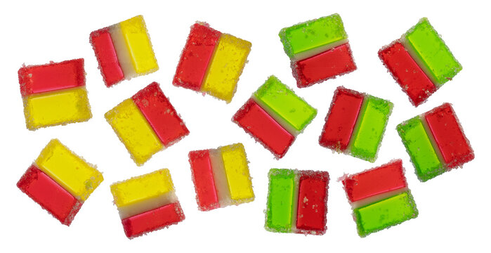 Set of vibrant three layered jelly marmalade candies isolated on transparent background without shadow. Scattered neon gummy sweets flat lay collection with clipping path