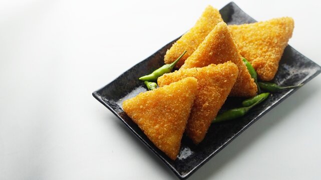 risol mayo (risoles mayo snack) isolated white background. Risoles mayo is one of popular food in Indonesia