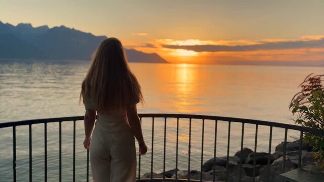 Young Blonde Woman Enjoying Sunset by Lake Geneva in Switzerland