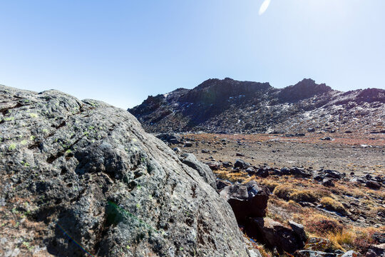 Large Volcanic Boulder in Alpine Wilderness Landscape