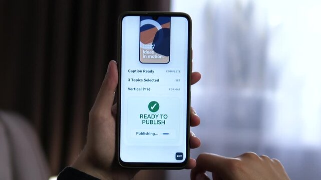 Content creator publishes a vertical mobile post from a smartphone, highlighting social media workflow, short-form content, digital publishing and creator economy trends.
