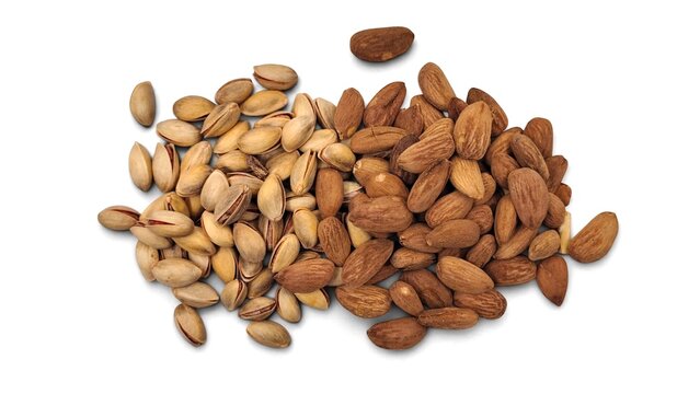 Top view of a pile of raw almonds and in-shell pistachios, isolated on white background, presenting a healthy mixed nut snack and natural organic food, ideal for nutrition and diet themes.   