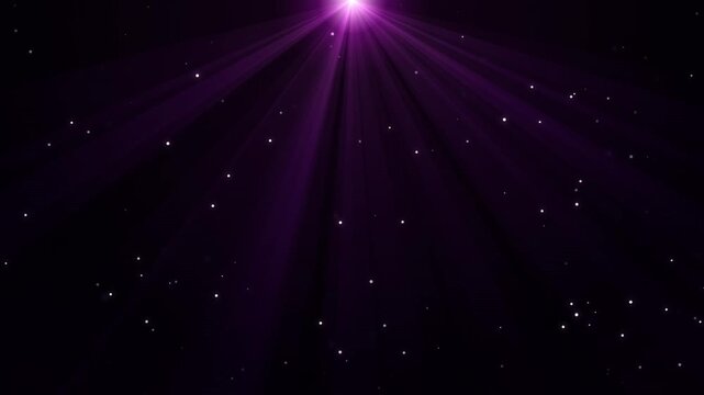 Purple light beams from spotlight with dust particles in darkness cinematic motion