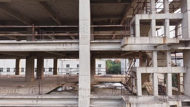 unfinished concrete building at construction site