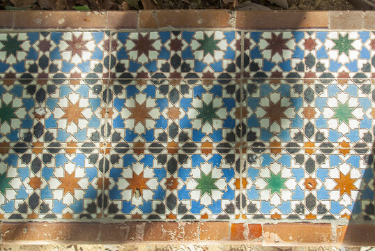 Traditional geometric ceramic tiles with star patterns in Seville, Andalusia, Spain