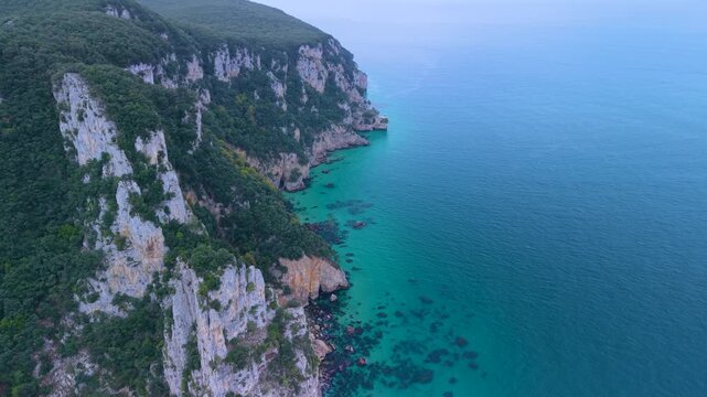 Aerial drone view of the landscape at Mount Buciero and the Faro del Caballo lighthouse in the Santo&ntilde;a, Victoria and Joyel Marshes Natural Park. Cantabrian Sea. Santo&ntilde;a. Cantabria. Spain. Europe