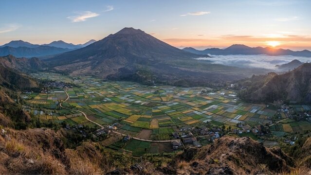wide-angle landscape from Bukit Pergasingan overlooking the Sembalun valley and Mount Rinjani