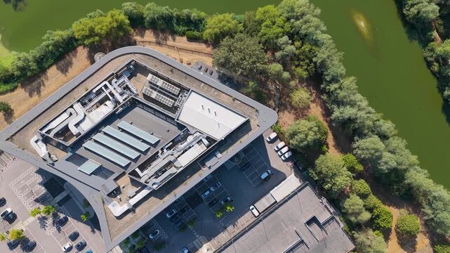 Aerial View of a Data Center by a Body of Water