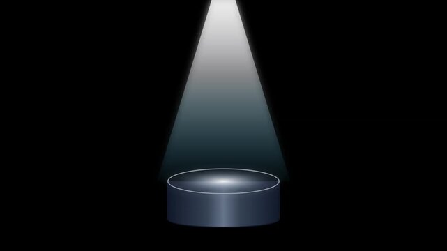 Bright spotlight illuminating empty circular podium stage against dark background during digital motion video clip execution