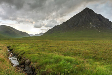 Stob Dearg peak of Buachaille Etive Mòr Highlands of Scotland, United Kingdom after sunset © Bogdan Lazar
