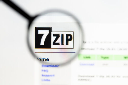 Milan, Italy 2026, 15 AGO Closeup of 7-zip org website page on a laptop screen. Focus on 7-zip org logo under a magnifying glass.