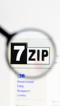 Milan, Italy 2026, 15 AGO Closeup of 7-zip org website page on a laptop screen. Focus on 7-zip org logo under a magnifying glass.