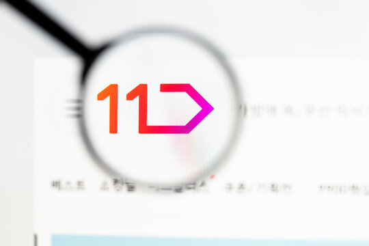 Milan, Italy 2026, 15 AGO Closeup of 11st co kr website page on a laptop screen. Focus on 11st co kr logo under a magnifying glass.