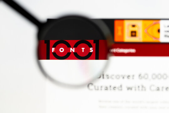 Milan, Italy 2026, 15 AGO Closeup of 1001fonts com website page on a laptop screen. Focus on 1001fonts com logo under a magnifying glass.
