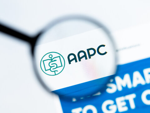 Milan, Italy 2026, 15 AGO Closeup of aapc com website page on a laptop screen. Focus on aapc com logo under a magnifying glass.