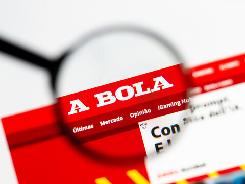 Milan, Italy 2026, 15 AGO Closeup of abola pt website page on a laptop screen. Focus on abola pt logo under a magnifying glass.