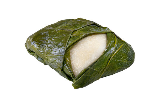 Pacific palusami feast parcel with glossy dark-green taro leaves folde Isolated on White Background