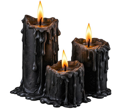 Three black pillar candles with melting wax and warm flames