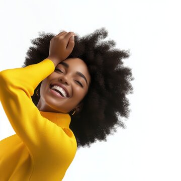 Happy Person With Curly Hair In Yellow Top Studio Portrait