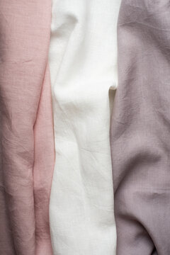 Draped Pastel Linen Fabric Texture in Pink, White, and Lilac