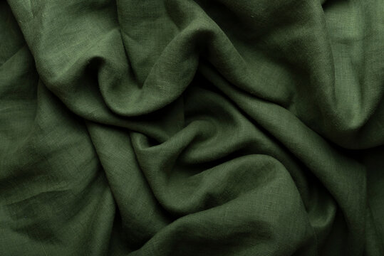 Crumpled Olive Green Linen Fabric Background