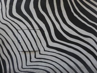 A zebra patterned graffiti mural © Jieun