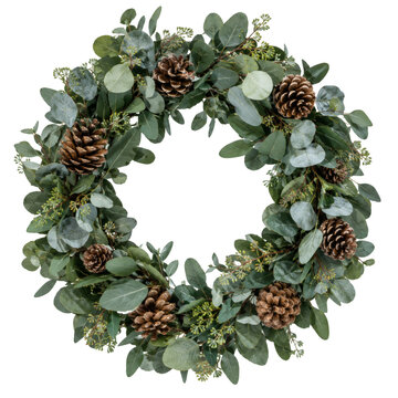 Elegant eucalyptus wreath with natural pine cones for festive seasonal home wall decoration