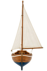 Detailed wooden model sailboat with white fabric sails isolated on a clean white background © Sapphire