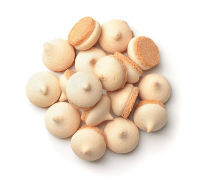 Top view of sweet beige mini meringue cookies