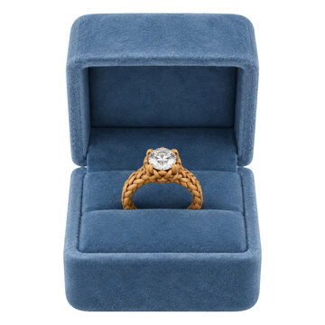 A unique braided gold engagement ring with a brilliant diamond set inside a blue velvet box