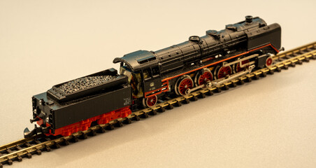 Z scale steam locomotive with tender on railway track, rear three quarter view © Pascal