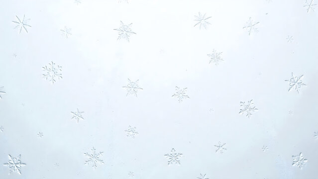 Beautiful white winter background with delicate snowflakes pattern for seasonal holiday design and greeting card