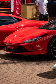 Red Ferrari F8 Tributo Supercar Front Bumper Detail Outdoor Paved Plaza Event